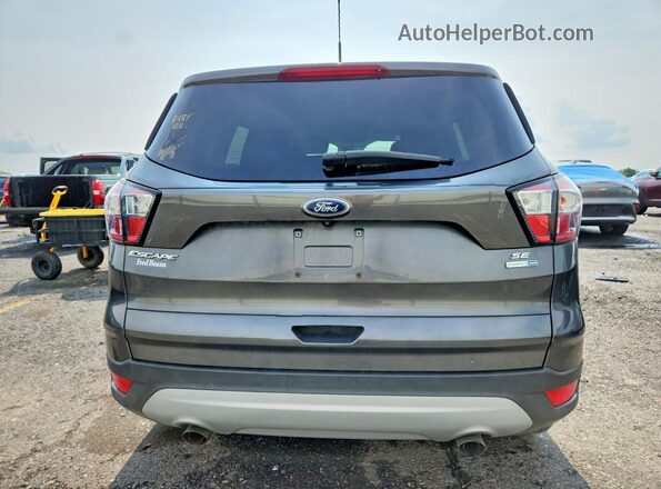 1FMCU9GD8JUB03042 2018 FORD ESCAPE Gray Вид салону спереду