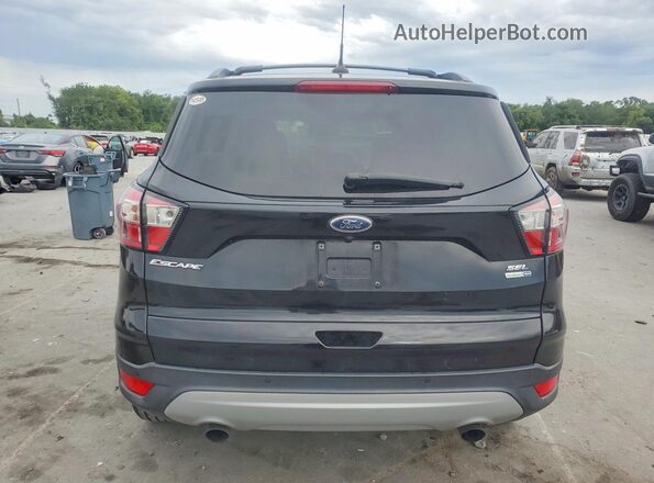 1FMCU9HD7JUC48426 2018 FORD ESCAPE Black Вид салону спереду