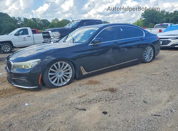 WBA7E2C55HG740100 2017 BMW 7 SERIES Black Tył lewy
