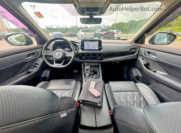 JN8BT3DDXPW306777 2023 NISSAN ROGUE Black Rear seats view