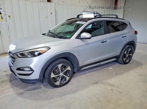 KM8J3CA27HU506941 2017 HYUNDAI TUCSON Silver Tył lewy