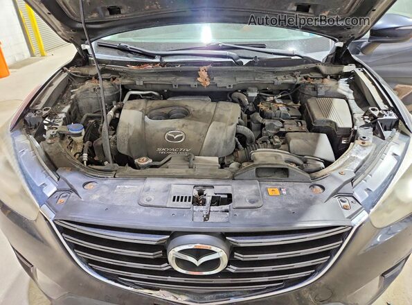 JM3KE4BY9G0630315 2016 MAZDA CX-5 Black VIN კოდის სტიკერის ხედი
