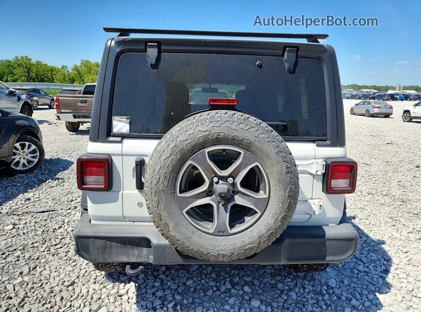 1C4HJXDG4KW506012 2019 JEEP WRANGLER White Front interior view