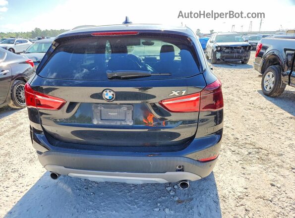 WBXHT3C34G5E55714 2016 BMW X1 Black Widok wnętrza z przodu