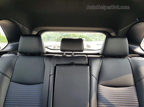 2T3E6RFV5RW053054 2024 TOYOTA RAV4 Silver Rear interior view