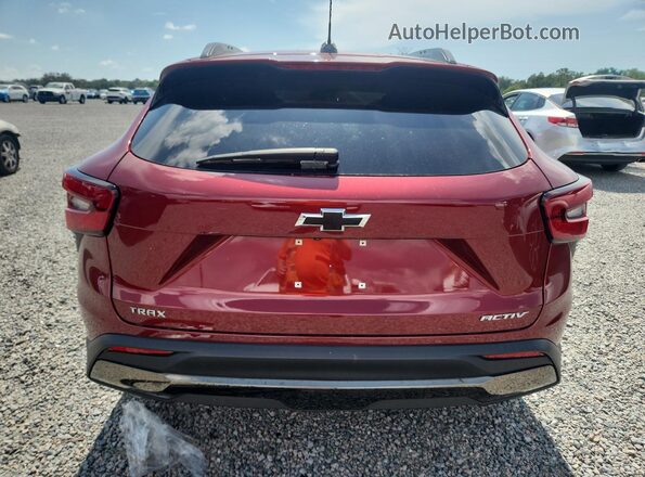 KL77LKE29RC056524 2024 CHEVROLET TRAX Бордовый Вид салона спереди