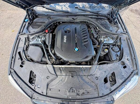 WBAJE7C50JG891256 2018 BMW 5 SERIES Charcoal Vista del salpicadero