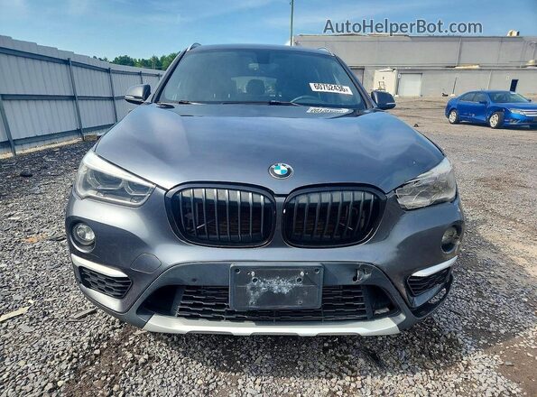 WBXHT3C33H5F72590 2017 BMW X1 Серый Вид сзади