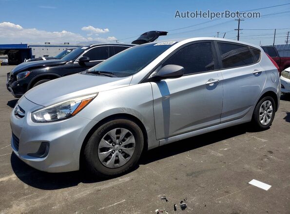 KMHCT5AE2HU312025 2017 HYUNDAI ACCENT Silver Trasero izquierdo