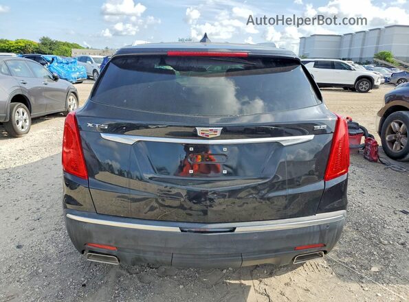 1GYKNERS6JZ201016 2018 CADILLAC XT5 Black Front interior view
