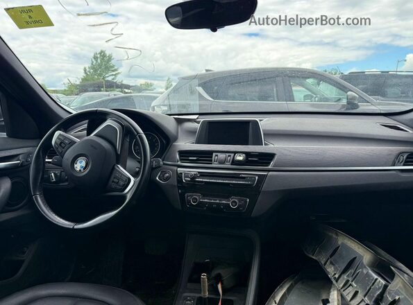 WBXHT3C34J5K22744 2018 BMW X1 Black Rear seats view