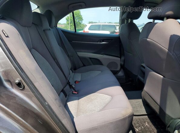 4T1C11BK7RU113010 2024 TOYOTA CAMRY Gray Rear interior view