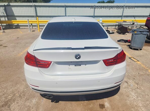 WBA3N7C51GK225750 2016 BMW 4 SERIES White Front interior view