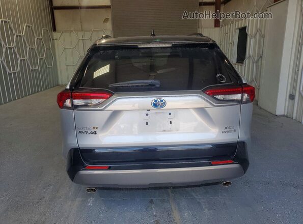 2T3EWRFV5KW015264 2019 TOYOTA RAV4 Silver წინა სალონის ხედი