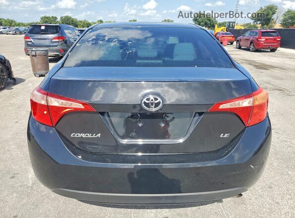 2T1BURHE2HC813469 2017 TOYOTA COROLLA Black Vista interior delantera
