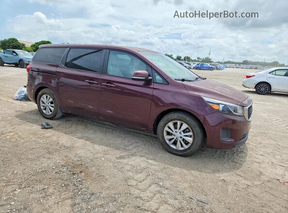 KNDMB5C16H6241163 2017 KIA SEDONA Maroon Front view