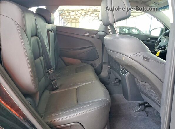 KM8J3CA2XGU192300 2016 HYUNDAI TUCSON Black Вид задньої частини салону