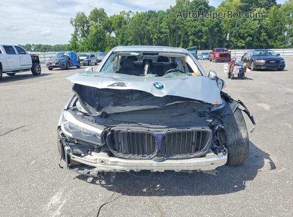 WBA7E4C50KGV28515 2019 BMW 7 SERIES Silver Вид ззаду