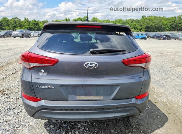 KM8J23A43HU580376 2017 HYUNDAI TUCSON Серый Вид салона спереди