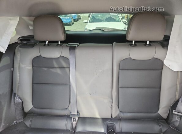 KL77LKE29RC056524 2024 CHEVROLET TRAX Бордовый Вид задней части салона