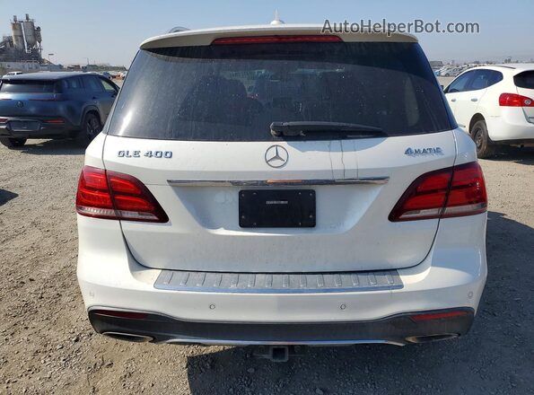 4JGDA5GB5GA633211 2016 MERCEDES-BENZ GLE-CLASS White Սալոնի դիմացի տեսք