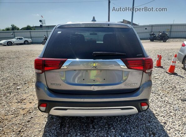 JA4AZ3A36KZ003420 2019 MITSUBISHI OUTLANDER Gray Vista interior delantera