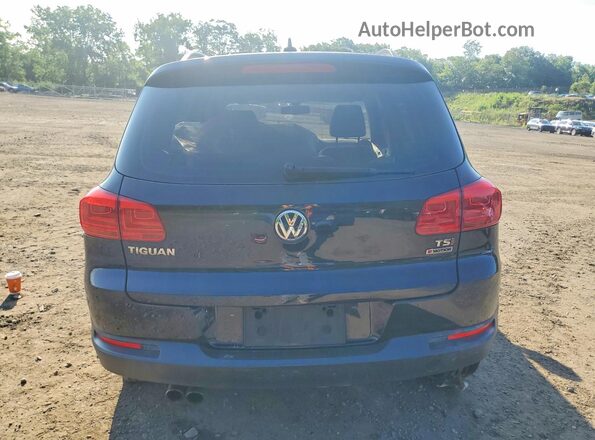 WVGBV7AX2HK029199 2017 VOLKSWAGEN TIGUAN Black Vista interior delantera