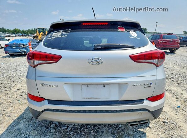 KM8J3CA25HU311078 2017 HYUNDAI TUCSON Silver Front interior view
