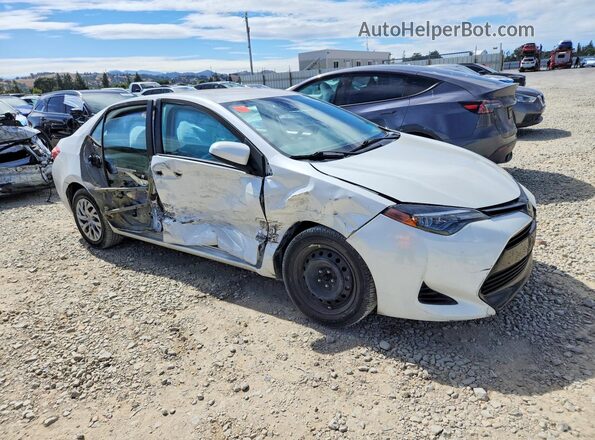 5YFBURHE5KP941857 2019 TOYOTA COROLLA Белый Вид спереди