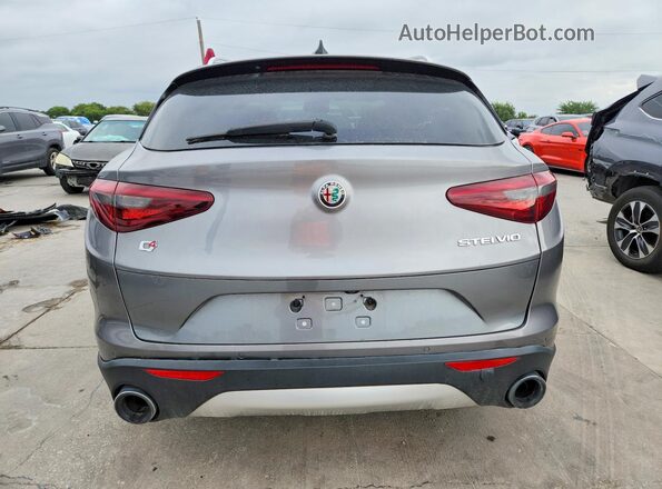 ZASFAKBN0J7B97991 2018 ALFA ROMEO STELVIO Gray Vista interior delantera