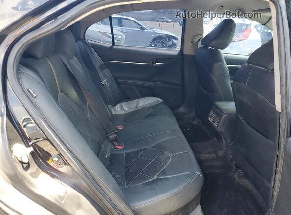 4T1B21HK7KU516393 2019 TOYOTA CAMRY Black Rear interior view