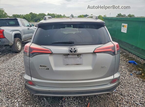 2T3WFREV6JW501876 2018 TOYOTA RAV4 Silver Widok wnętrza z przodu