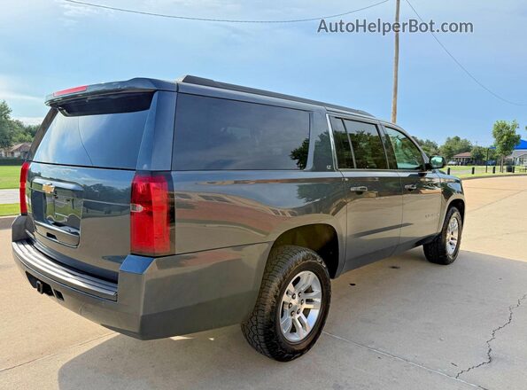 1GNSKHKC6KR275841 2019 CHEVROLET SUBURBAN Gray წინა ხედი