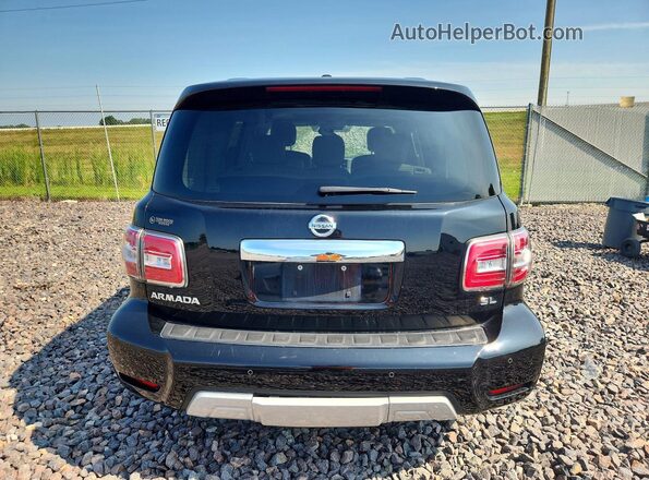 JN8AY2NC2J9556050 2018 NISSAN ARMADA Black Vista interior delantera