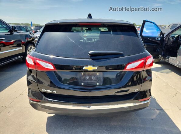 2GNAXKEVXL6243110 2020 CHEVROLET EQUINOX Черный Вид салона спереди