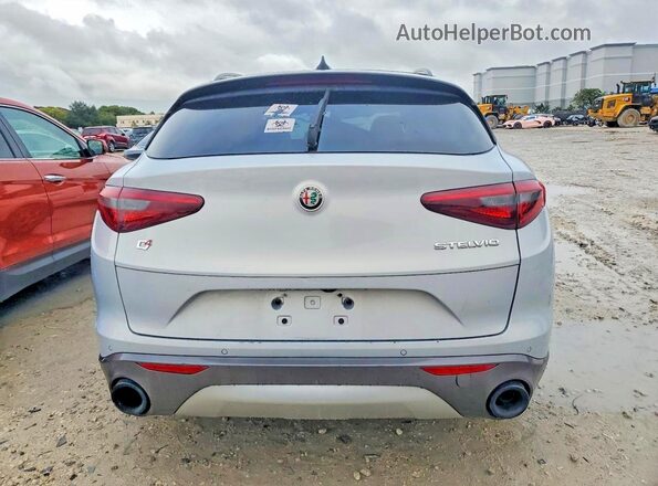 ZASPAKBN0N7D46121 2022 ALFA ROMEO STELVIO Silver Front interior view
