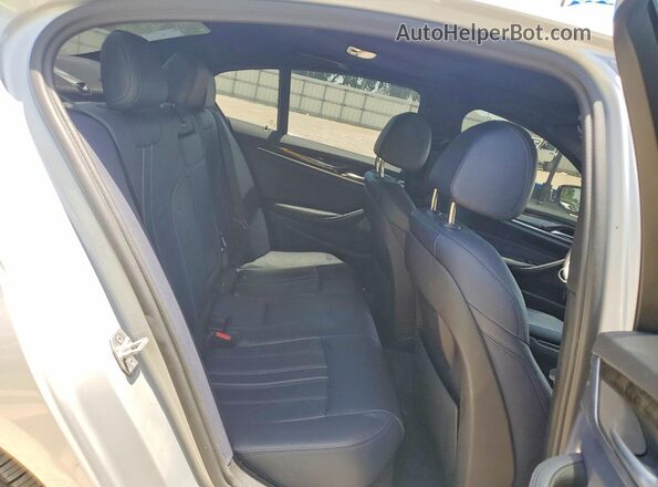 WBAJA7C39HG905868 2017 BMW 5 SERIES Silver Rear interior view