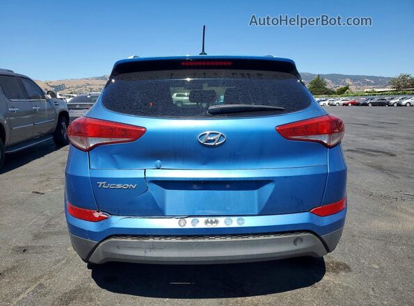 KM8J33A44GU091674 2016 HYUNDAI TUCSON Blue Vista interior delantera