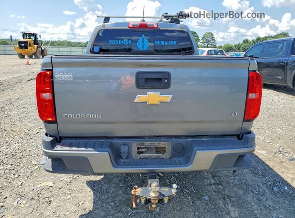1GCPTCE17J1281637 2018 CHEVROLET COLORADO Gray Вид салону спереду