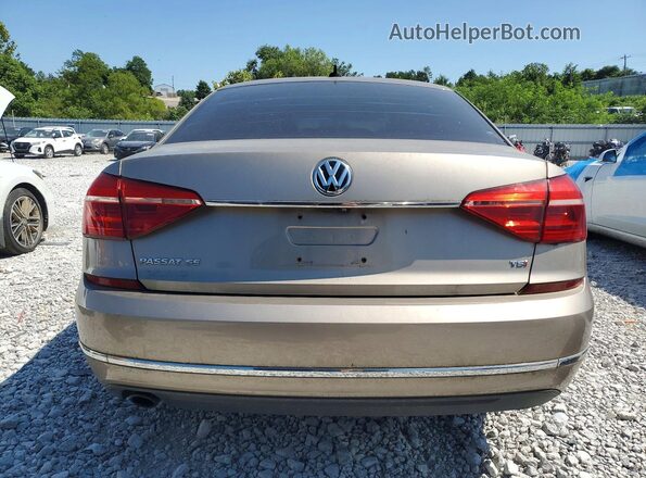 1VWBT7A36GC014458 2016 VOLKSWAGEN PASSAT Gold Widok wnętrza z przodu