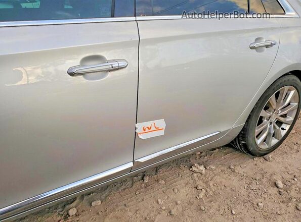 2G61M5S30H9106711 2017 CADILLAC XTS Silver VIN კოდის სტიკერის ხედი