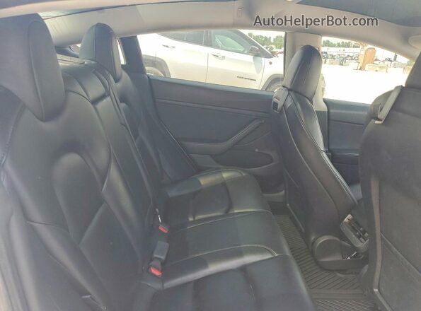 5YJ3E1EA1MF084679 2021 TESLA MODEL White Vista interior trasera