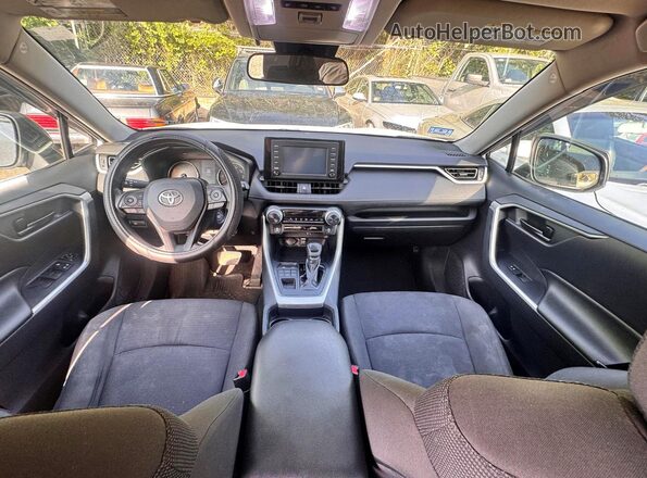 2T3F1RFVXKC029357 2019 TOYOTA RAV4 White Vista de los asientos traseros
