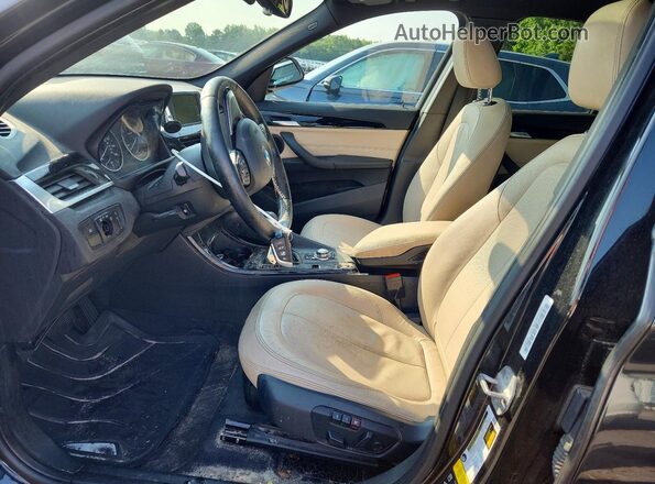 WBXHT3C33G5E47698 2016 BMW X1 Black Առջևի վահանակի տեսք