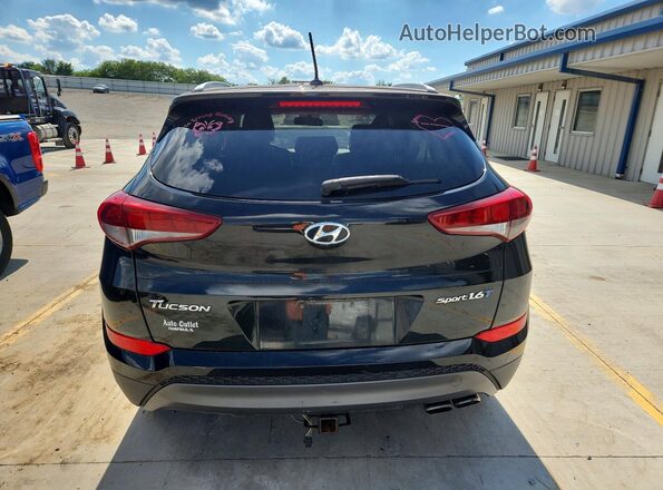 KM8J33A25GU044734 2016 HYUNDAI TUCSON Black Вид салону спереду