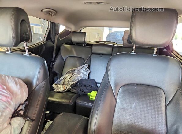 5XYZU3LA4GG320475 2016 HYUNDAI SANTA Silver Vista interior trasera