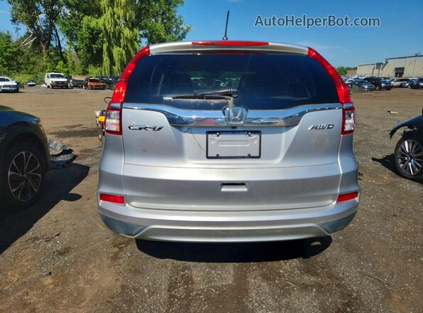 2HKRM4H50GH700293 2016 HONDA CR-V Silver Front interior view