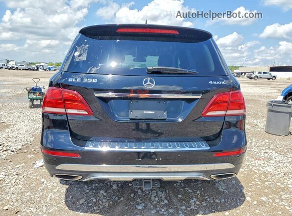 4JGDA5HB0GA703910 2016 MERCEDES-BENZ GLE-CLASS Black Front interior view