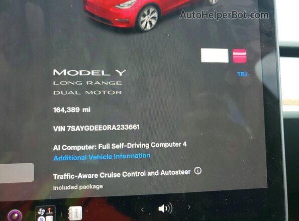 7SAYGDEE0RA233661 2024 TESLA MODEL Y Red Rear seats view
