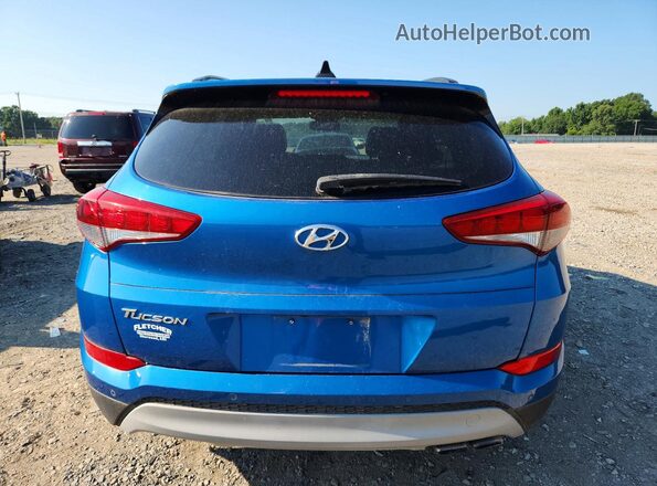 KM8J33A27JU805383 2018 HYUNDAI TUCSON Blue Widok wnętrza z przodu